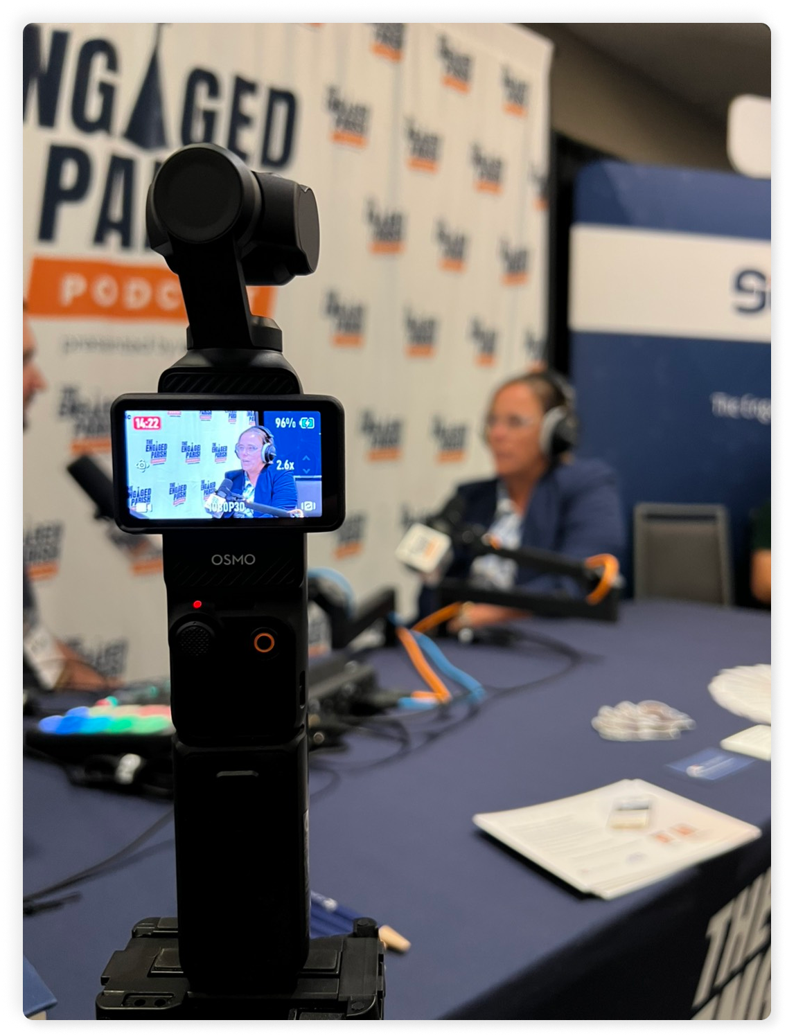 The Engaged Parish Podcast booth at CMC 2025