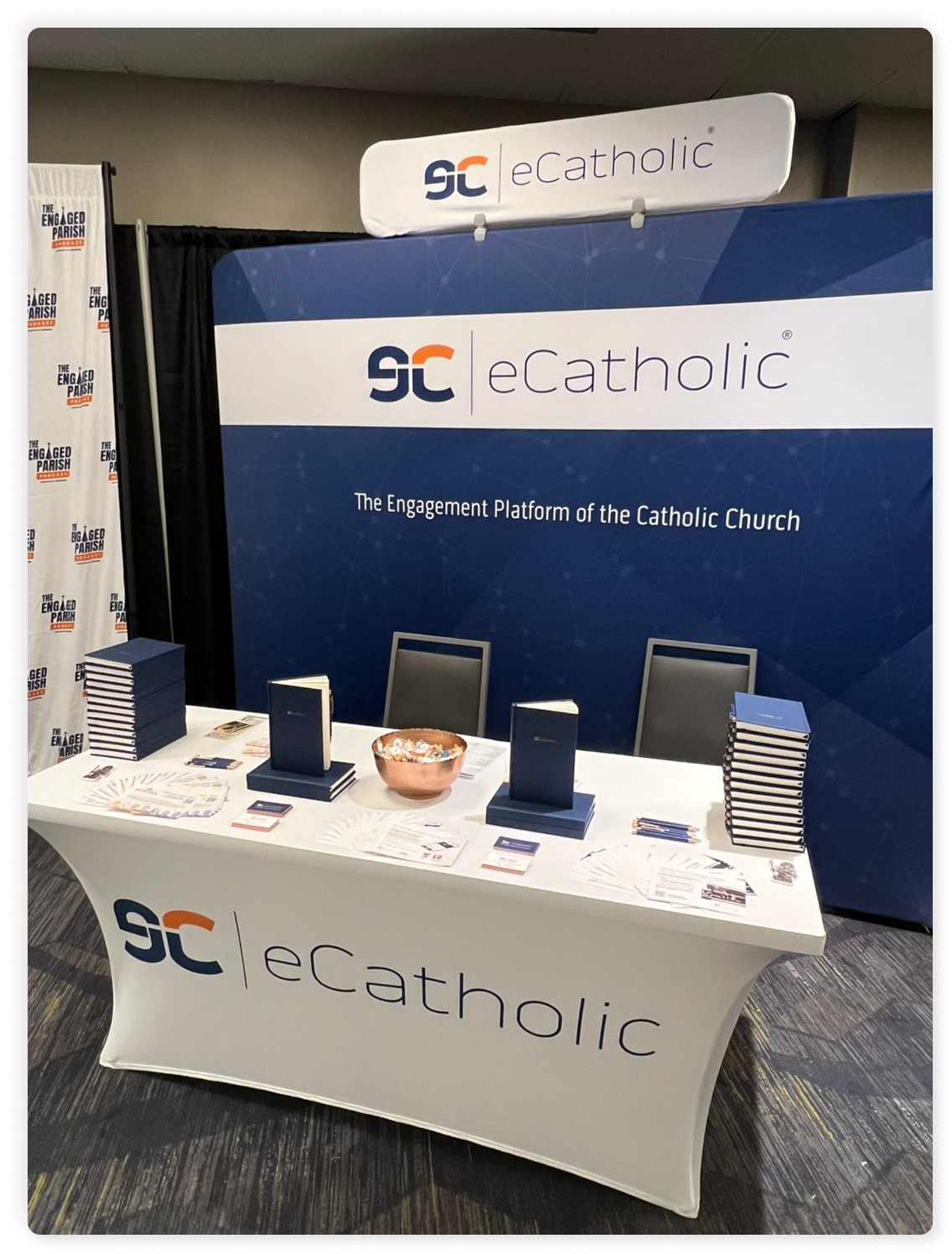 eCatholic conference booth with swag at CMC 2025