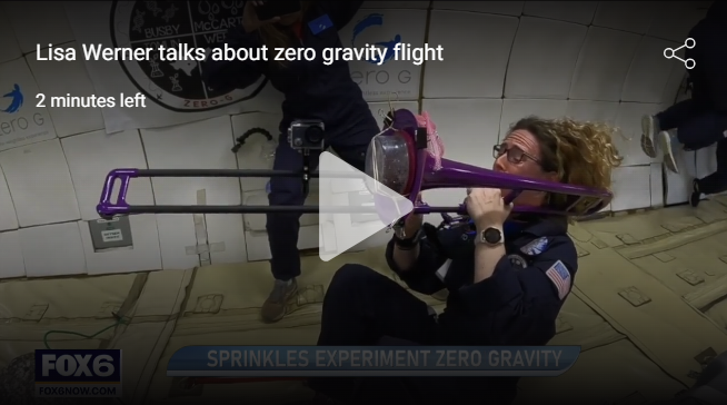 Lisa Werner plays purple trombone in Zero Gravity Flight