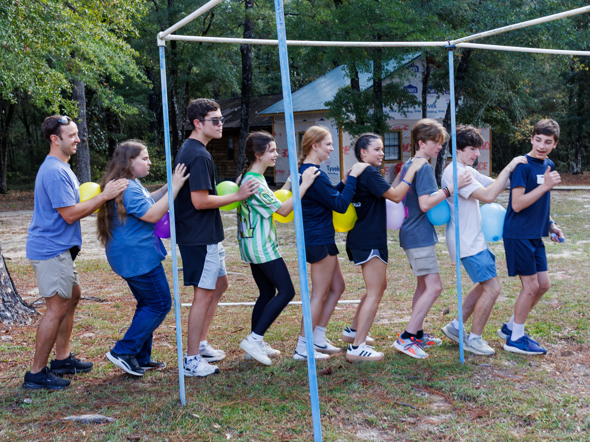 youth playing a team-building exercise