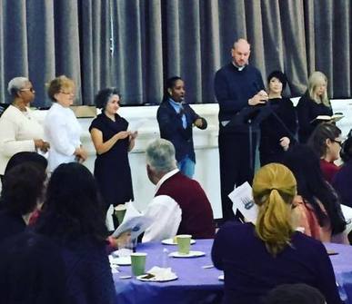 Deaf parishioners proclaiming Scripture in ASL