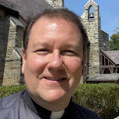 Reverend Monsignor Luke M. Sweeney, S.T.L.