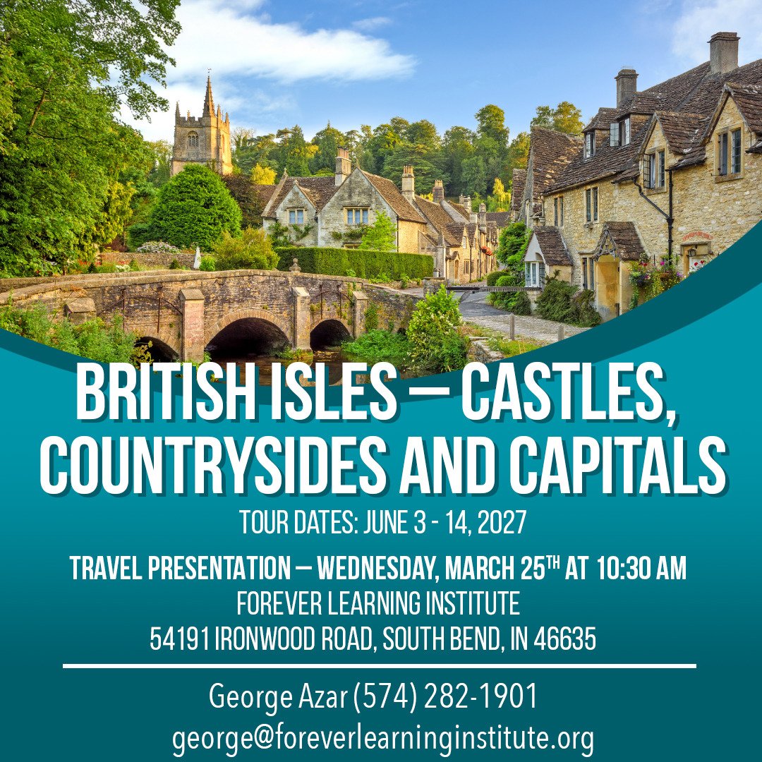 A cozy village of mediaeval stone buildings rises behind a meandering river of green and blue