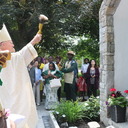 New Marian grotto honors late priest, hall named for bishop