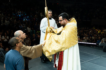 Popular Brazilian priest attracts thousands to local conference; Bishop gives hope to community