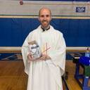 Nouvel Celebrates Father Adam Maher's Baptism Anniversary at Mass