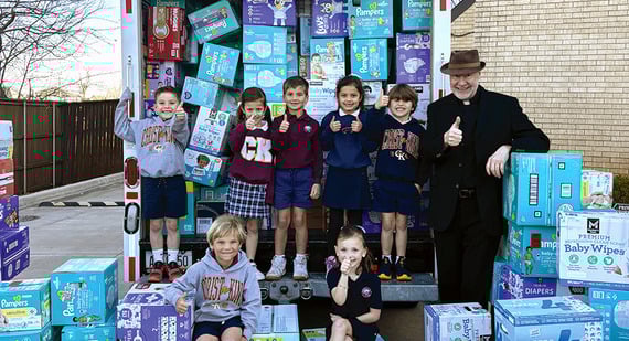 Christ the King posts record-breaking donation for Infant Crisis Services