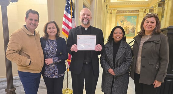 Fr. Scott Boeckman receives Human Rights Award