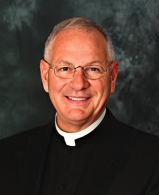 REV. MSGR. KEITH DEROUEN