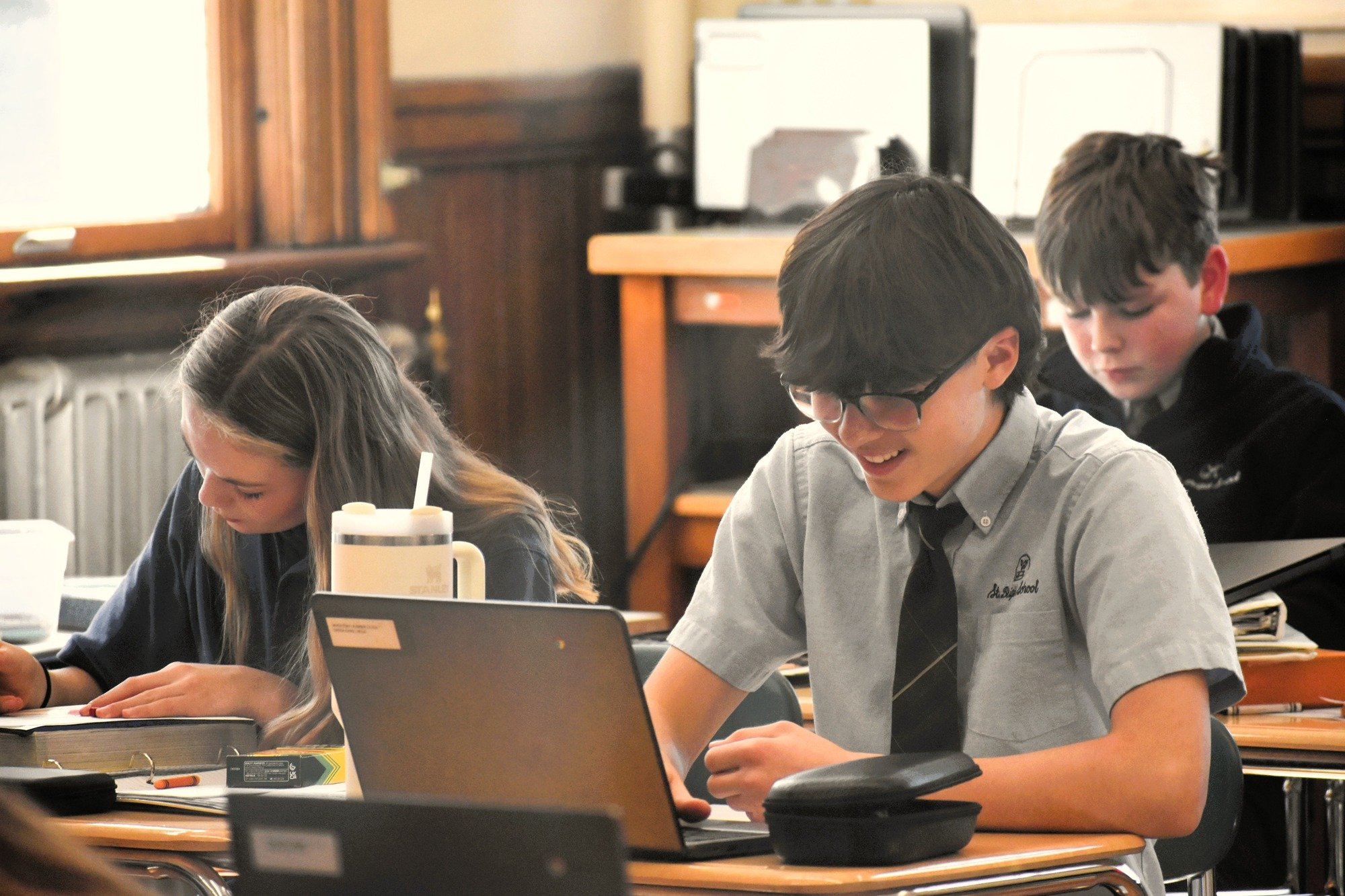 Computer use at St. Brigid School is balanced with hands on learning.