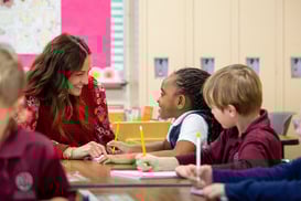 SACS First grade teacher and students image