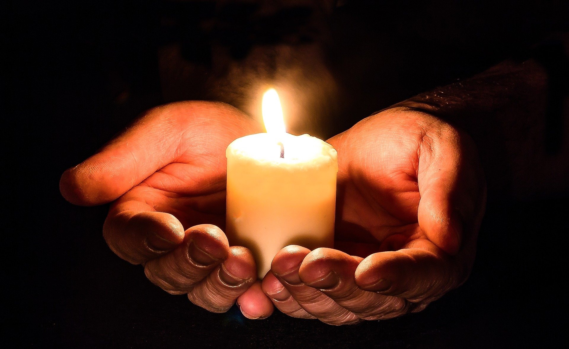 Hands holding candle - free Image by Myriam Zilles from Pixabay - hands-1926414_1920