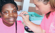 Academy of Our Lady paints volleyball game pink