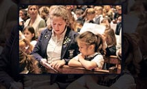 Mass buddies at Ursuline help younger students