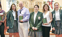 Cabrini students honor four former teachers who lit a fire