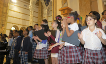 All together now! two elementary school CHoirs sing in unison