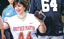 Gayle Benson’s double duty