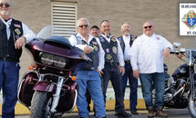 Growing the KCs with motorcycles and yard signs