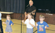 ‘Wednesday wake-ups’ come courtesy of St. Angela’s guitar-playing pastor