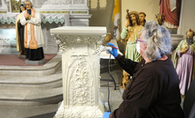 St. John the Baptist’s restored statues shine at 100