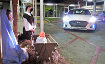 Motoring to Bethlehem: Our Lady of Lourdes drama club stages drive-thru Living Nativity