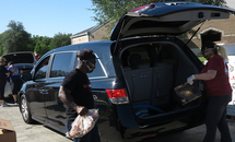 Catholic Charities, Second Harvest fill trunks with needed food