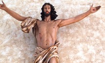 Christ stands outside the tomb, sharing his light