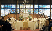 Archbishop 'goes home' to St. Ann for golden Mass
