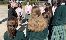 20,000 cans of food from Archbishop Chapelle