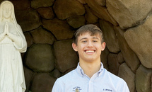 Drawn to the faith, Holy Cross junior becomes Catholic