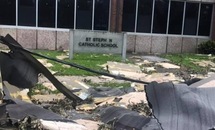 St. Stephen’s gym roof, church steeple lashed by Ida