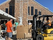 St. Catherine of Siena delivers $52,000 in hurricane aid
