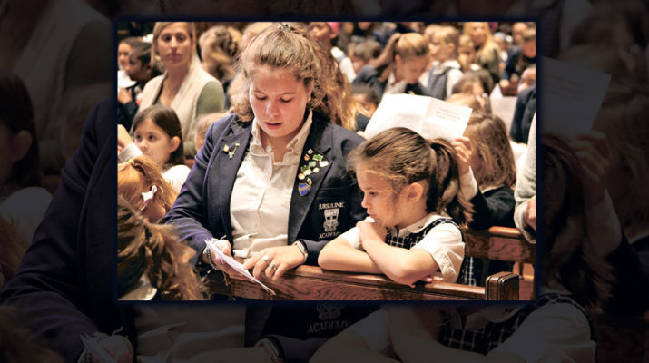 Mass buddies at Ursuline help younger students