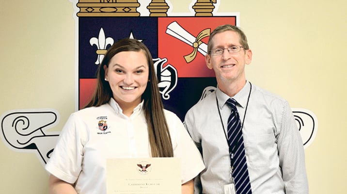 Senior Kurucar wins service award at Archbishop Hannan High