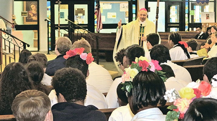 St. Thérèse lights up feast day at new school