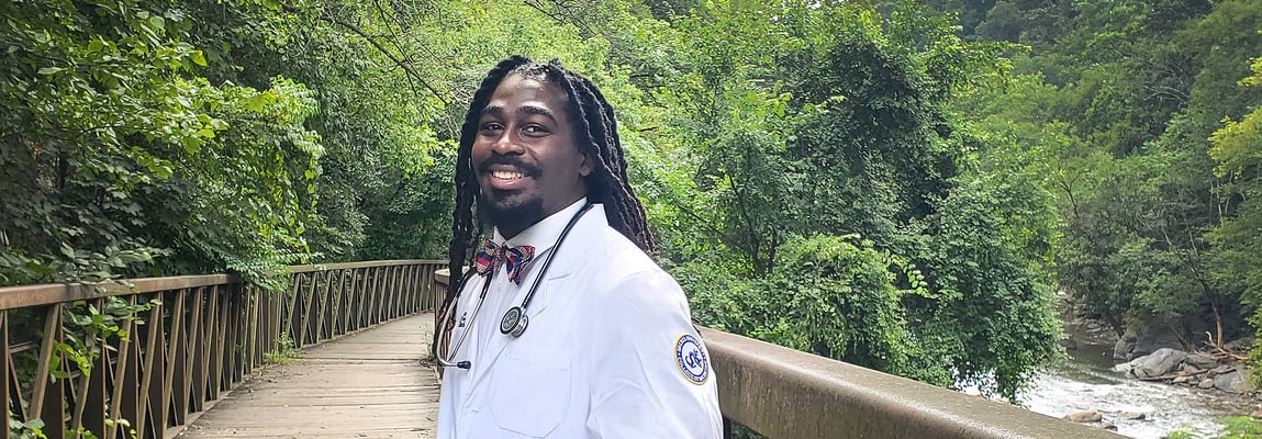 Fr. Tompson’s ‘dream school’ celebrates its first med student