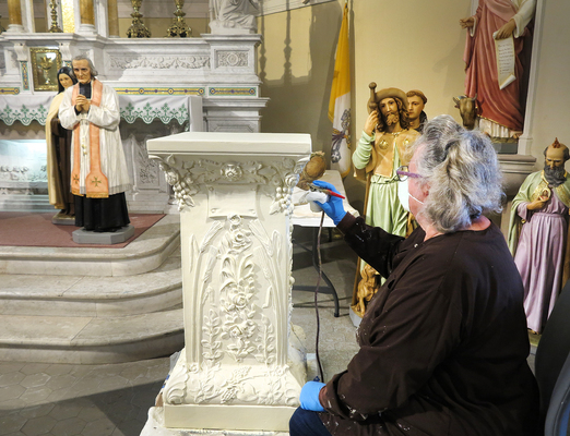 St. John the Baptist’s restored statues shine at 100