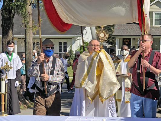 Eucharistic procession honors Christ the King