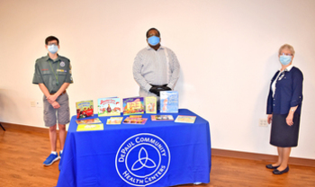 Teen donates books to health centers