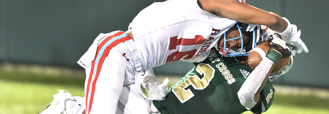 Wearing o’ the green a lucky charm for Holy Cross
