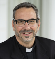 Priest serves as ‘the keeper of the sacred stories’