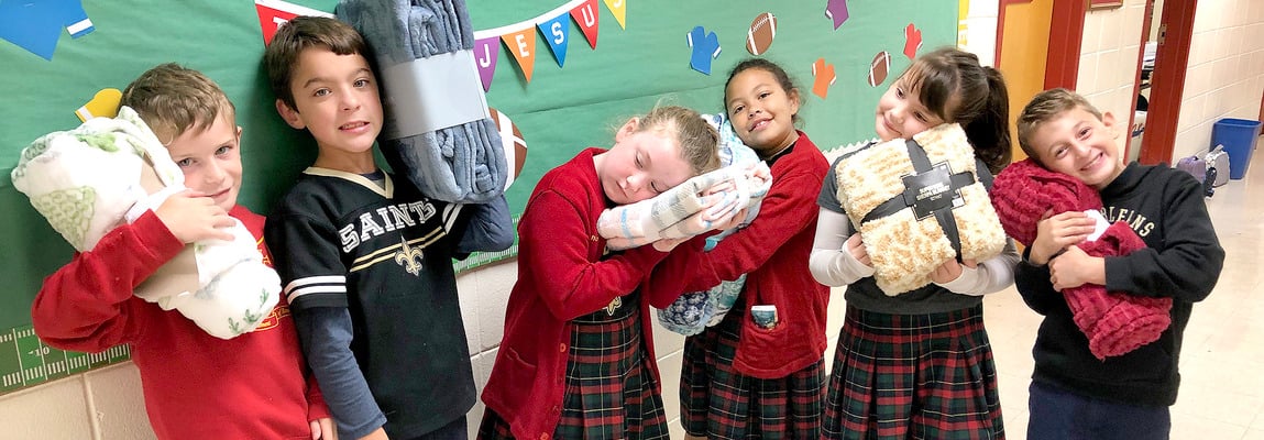 St. Clement of Rome third graders cover The Good Shepherd School in love