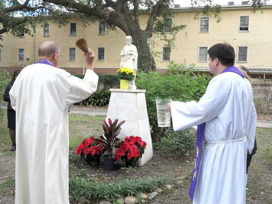 St. Joseph statue, hurt by Ida, back in place at St. Alphonsus