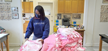 Ursuline junior coordinates blanket-making drive to warm all ages