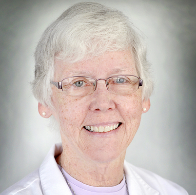 Dominican Sister of Peace Suzanne Brauer helps kids prepare for this weekend’s Gospel
