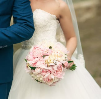 Brides on a budget can employ a creative flower strategy