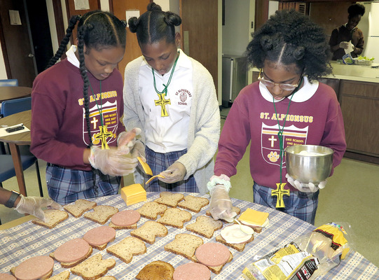 St. Alphonsus students make sandwiches for homeless throughout the school year