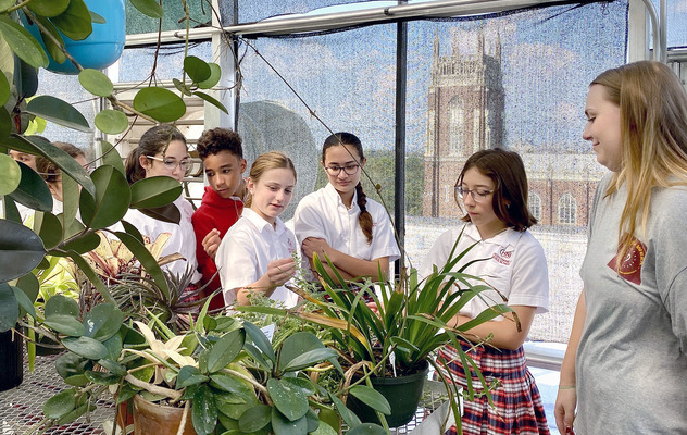 Holy Name of Jesus students get their hands dirty in Loyola’s sky garden