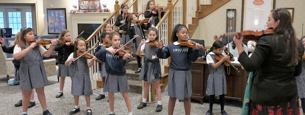 No strings attached: All Ursuline 3rd & 4th graders learn how to play the violin