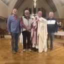 Deacon Winder receives dalmatic and stole during Mass